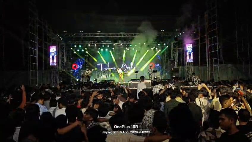 Concert crowd under laser and beam lights