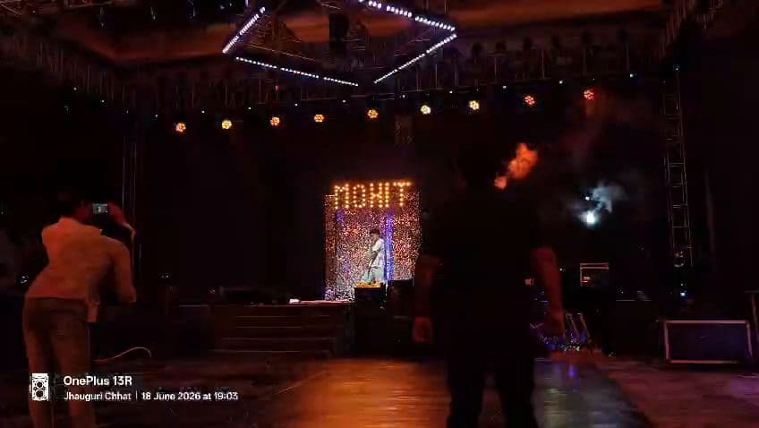 Banquet stage with lit name backdrop
