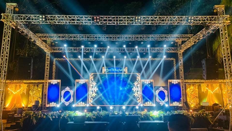 Full truss stage with lighting rig and LED backdrop